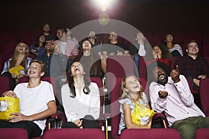 Audience In Cinema Watching Comedy Film