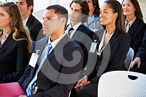 Audience Listening To Presentation At Conference