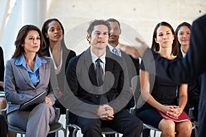 Audience Listening To Presentation At Conference