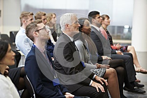 Audience Listening To Speaker At Conference Presentation