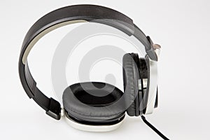 Audio black headphones dj in white studio background