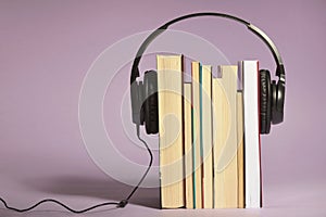 Audio books concept with books and headphones