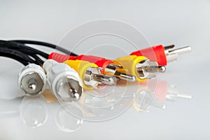 Audio cables, connection plugs, multicolored, isolated on a background, audio cord cable, connecting digital