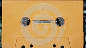 Audio cassette tape with a blank white label