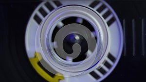 Audio Cassette Tape Reel Spinning in Player, Macro Close Up