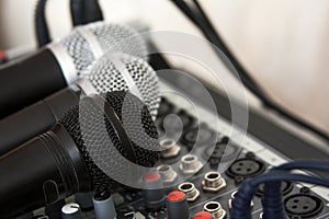 Audio equipment, microphones and mixer, home recording, home studio concept, vocals recording, podcasting, amateur music productio photo