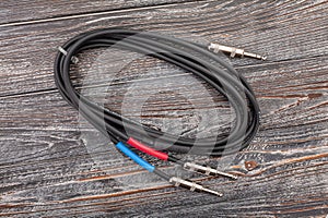 audio insert splitter cable on wood