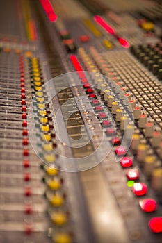 Audio mixer mixing board fader and knobs photo