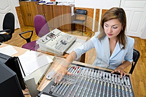 audio operator at audio control console