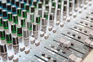 Audio sound mixer control panel.  Sound console buttons for adjust the volume