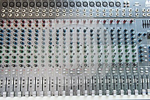 Audio sound mixer control panel.  Sound console buttons for adjust the volume