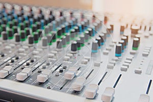 Audio sound mixer control panel.  Sound console buttons for adjust the volume