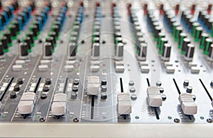 Audio sound mixer control panel.  Sound console buttons for adjust the volume