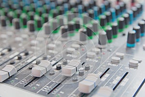 Audio sound mixer control panel.  Sound console buttons for adjust the volume