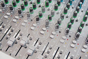 Audio sound mixer control panel.  Sound console buttons for adjust the volume