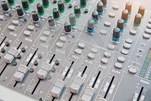 Audio sound mixer control panel.  Sound console buttons for adjust the volume