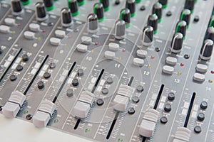 Audio sound mixer control panel.  Sound console buttons for adjust the volume