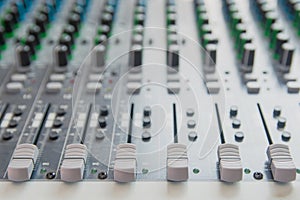 Audio sound mixer control panel.  Sound console buttons for adjust the volume