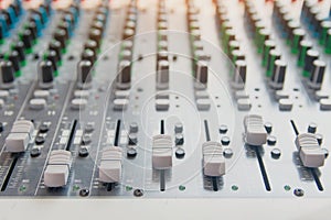 Audio sound mixer control panel.  Sound console buttons for adjust the volume