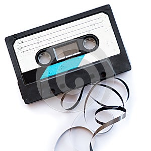 Audio tape blank label rolled out isolated white playlist