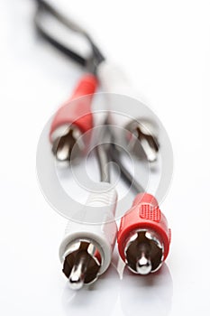 Audio and video cable on white background
