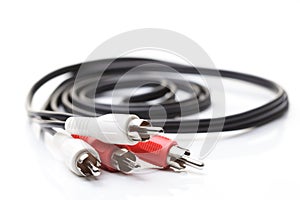 Audio and video cables on white background