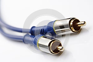 Audio and video cables on white background