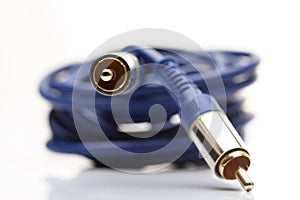 Audio and video cables on white background
