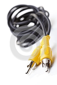 Audio and video cables on white background