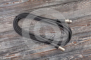 audio xlr cable on wood