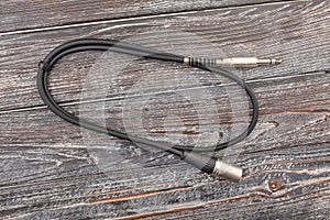 audio xlr trs cable on wood