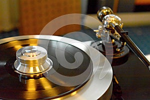 Audiophile turntable with vinyl record.