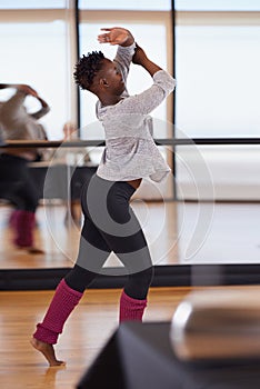 Audition, black girl and dancer, dancing and art, performance and health in competition and flexible. Ballet, elegant