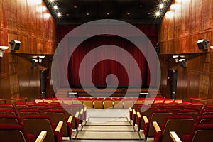 Auditorium with red chairs