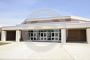 Auditorium sign and entrance for modern school