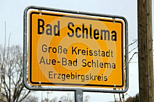 Aue-Bad Schlema, Germany - March 31, 2024: City limit sign at the entrance to Bad Schlema, a former mining town and spa resort in
