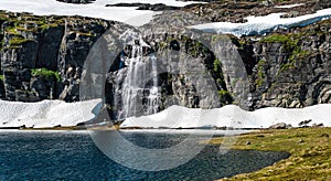 Auerlandsfjellet, Flotvatnet lake with waterfall Flotane.