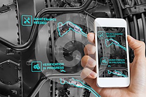 Augmented Reality technology maintenance, technician using smartphone, AR interface, monitoring