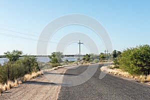 Augrabies Falls entrance road with Orange River in flood