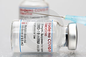 Vials with the Moderna Covid-19 vaccine are used at the corona vaccination centres worldwide