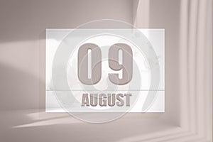 august 09. 09th day of the month, calendar date.White sheet of paper with numbers on minimalistic pink background with