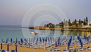 August 2, 2017.Protaras.Chairs with umbrellas on the beach in Fig tree Bay in Protaras .Cyprus.