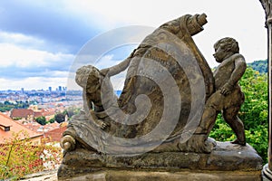 August 22, 2022 Prague, Czech Republic. Ancient sculpture in urban architecture. Background with selective focus
