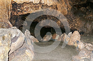 August 25, 2021. Simferopol region, Republic of Crimea. An excursion group of tourists enters the Red Caves