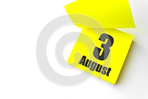 August 3rd. Day 3 of month, Calendar date. Close-Up Blank Yellow paper reminder sticky note on White Background. Summer month, day