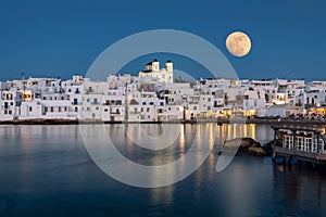 August full moon over the idyllic village of Naousa, Paros