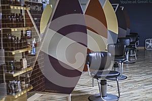 Great Clips at night row of barber chairs inside