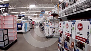 Walmart Supercenter retail store interior main aisle back