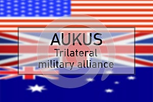 AUKUS - Trilateral military alliance. Country cooperation concept. Flags of different countries