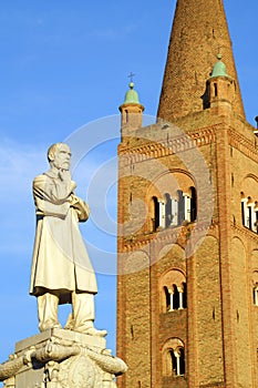 Aurelio Saffi statue and Abbey of Saint Mercurialis bell tower in ForlÃ¬, Italy